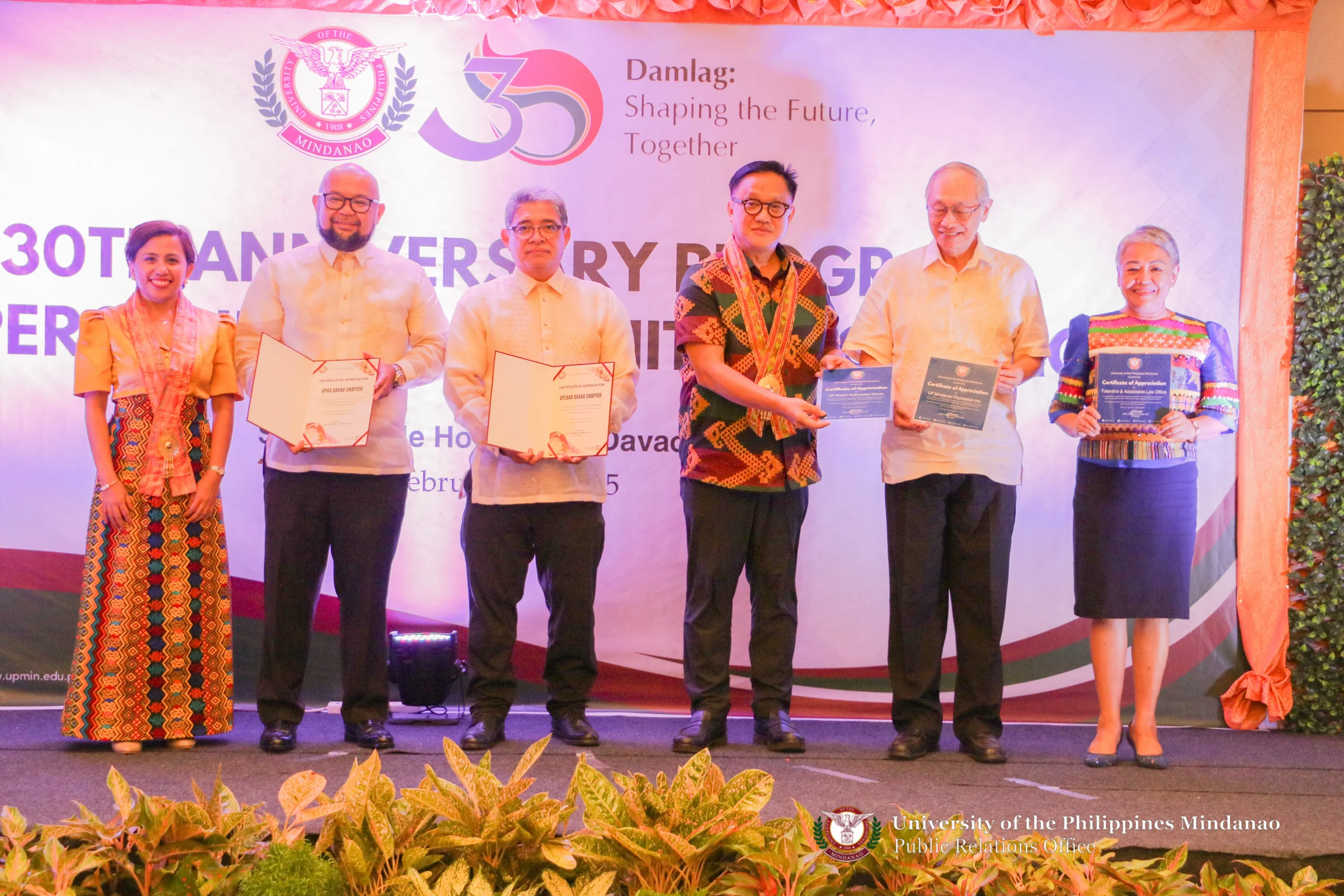 At the UP Mindanao anniversary ceremony are (left-right) UPMin Chancellor Lyre Anni Murao, UPAA-Davao's Khalil Guinomla, UPLBAA-Davao's Michael Cantos, UP Pres. Angelo Jimenez, UPMFI's John Gaisano and Dinah-Tolentino-Fuentes