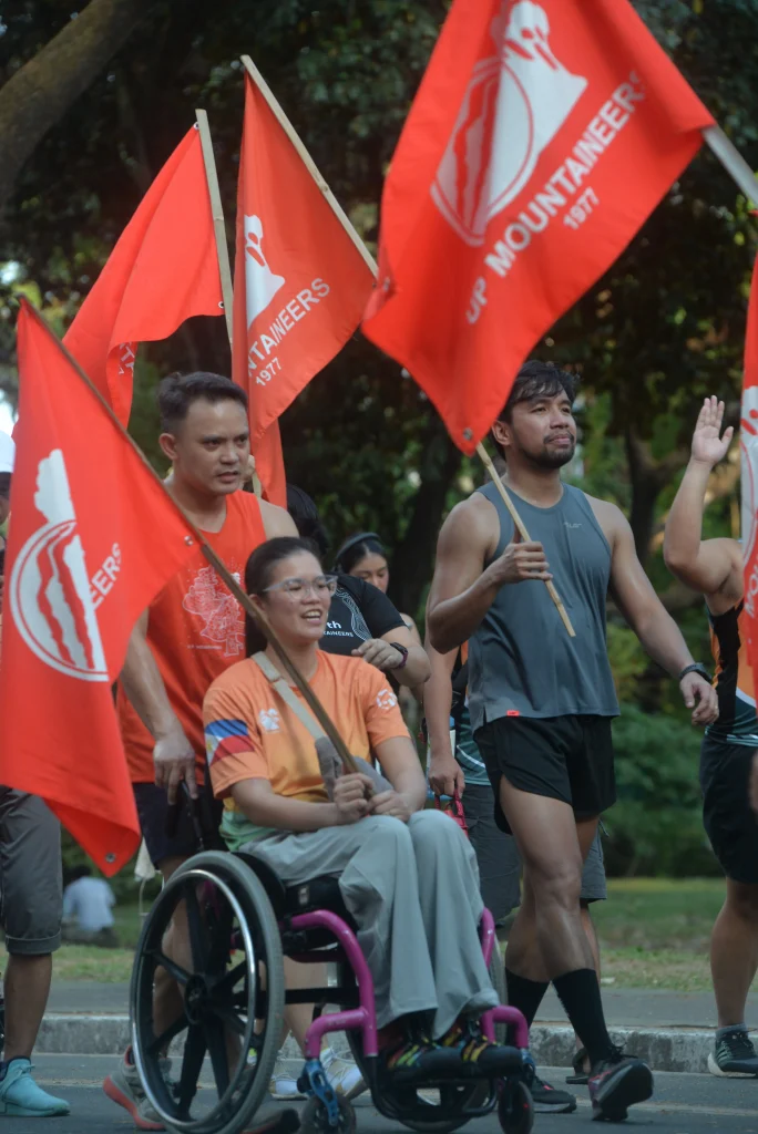 UPM Batch 2015-A Aie Camara with husband, Red, joining the final lap of the 48-hour run. Aie survived the fatal truck accident in Katipunan last December 5, 2024, which killed four persons and injured over 30.